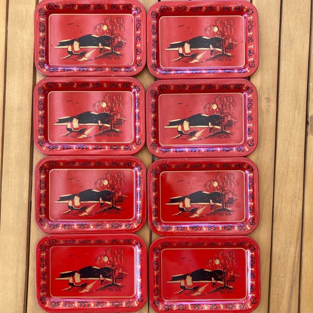 Vintage set of 8 small oriental red metal trays